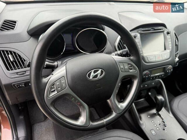 Коричневий Хендай іх35, об'ємом двигуна 2 л та пробігом 211 тис. км за 17400 $, фото 107 на Automoto.ua