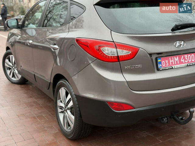 Коричневий Хендай іх35, об'ємом двигуна 2 л та пробігом 230 тис. км за 14300 $, фото 53 на Automoto.ua