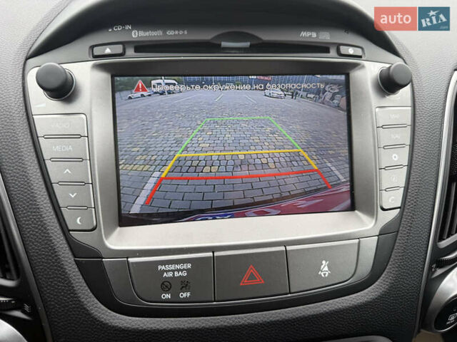 Коричневий Хендай іх35, об'ємом двигуна 2 л та пробігом 211 тис. км за 17400 $, фото 27 на Automoto.ua