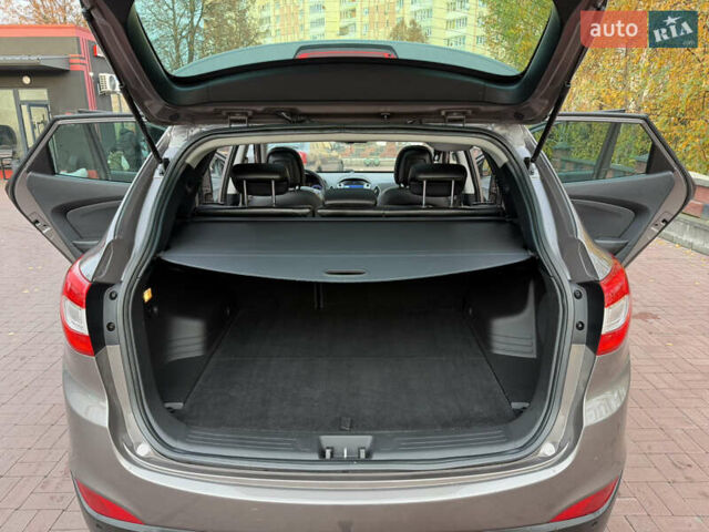 Коричневий Хендай іх35, об'ємом двигуна 2 л та пробігом 230 тис. км за 15300 $, фото 33 на Automoto.ua