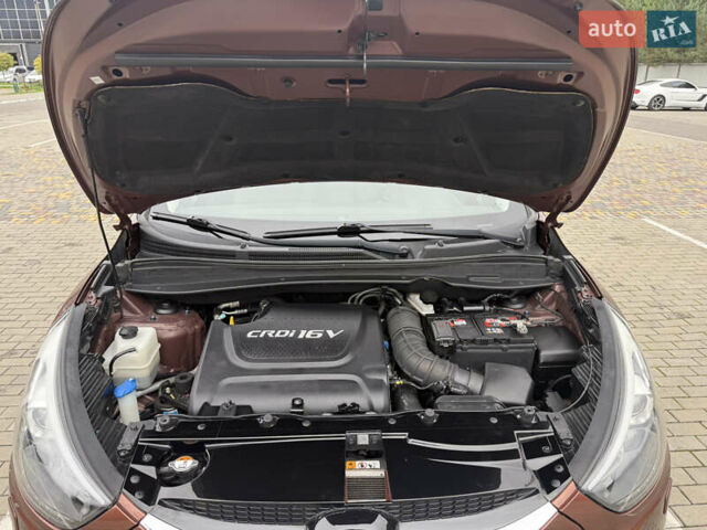 Коричневий Хендай іх35, об'ємом двигуна 2 л та пробігом 211 тис. км за 17400 $, фото 29 на Automoto.ua