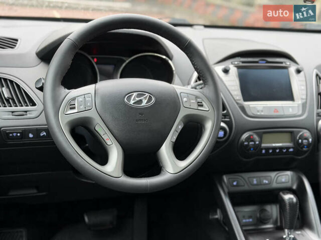 Коричневий Хендай іх35, об'ємом двигуна 2 л та пробігом 230 тис. км за 14300 $, фото 35 на Automoto.ua