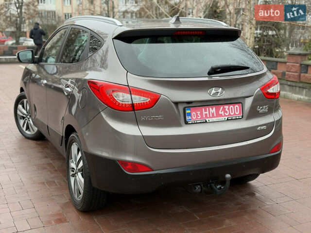 Коричневий Хендай іх35, об'ємом двигуна 2 л та пробігом 230 тис. км за 14300 $, фото 49 на Automoto.ua