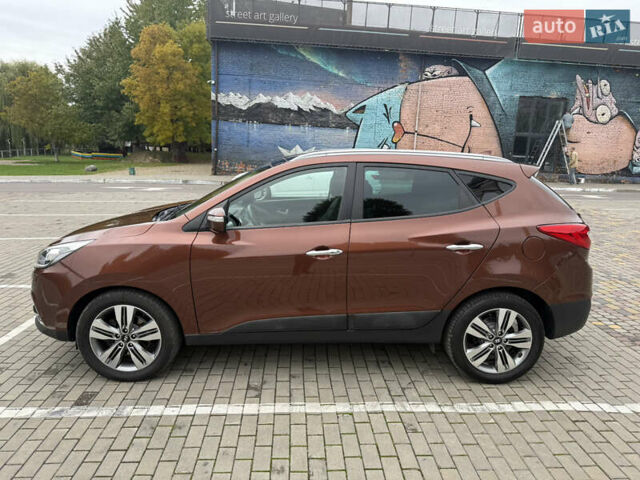 Коричневий Хендай іх35, об'ємом двигуна 2 л та пробігом 211 тис. км за 17400 $, фото 13 на Automoto.ua