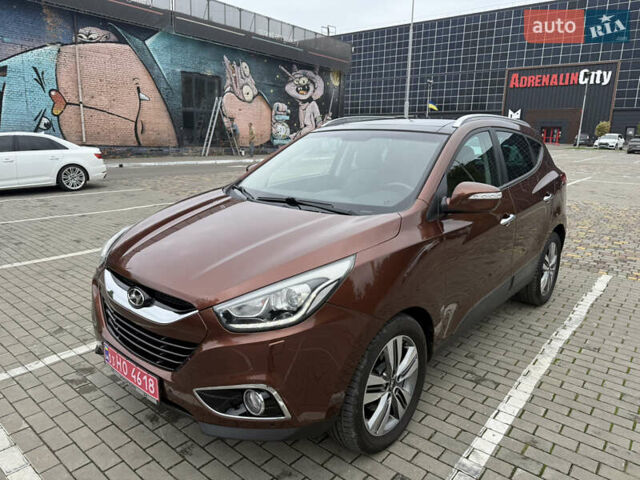 Коричневий Хендай іх35, об'ємом двигуна 2 л та пробігом 211 тис. км за 17400 $, фото 8 на Automoto.ua