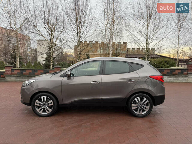 Коричневий Хендай іх35, об'ємом двигуна 2 л та пробігом 230 тис. км за 14300 $, фото 13 на Automoto.ua