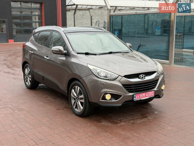 Коричневий Хендай іх35, об'ємом двигуна 2 л та пробігом 230 тис. км за 14300 $, фото 69 на Automoto.ua