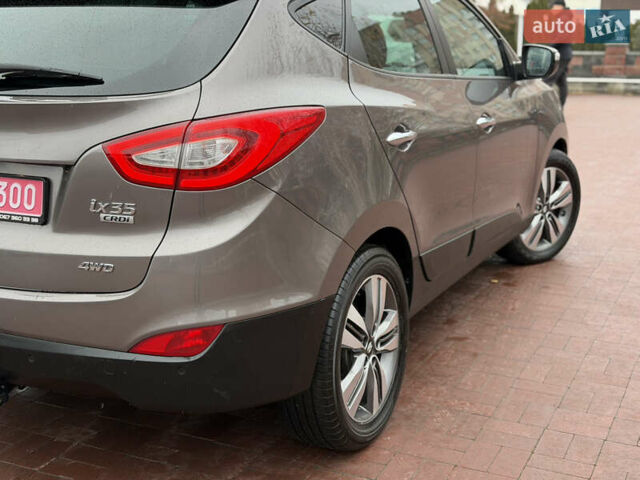 Коричневий Хендай іх35, об'ємом двигуна 2 л та пробігом 230 тис. км за 14300 $, фото 52 на Automoto.ua