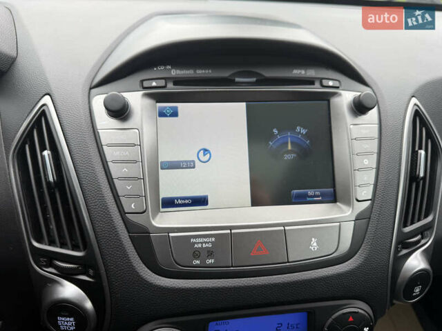 Коричневий Хендай іх35, об'ємом двигуна 2 л та пробігом 211 тис. км за 17400 $, фото 25 на Automoto.ua