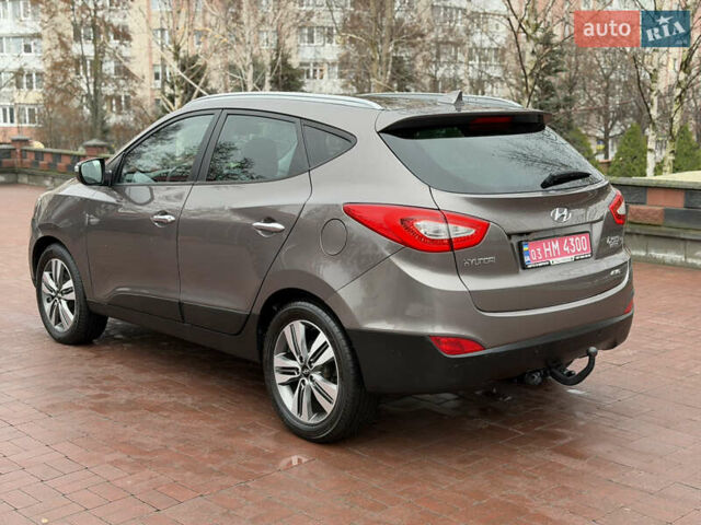 Коричневий Хендай іх35, об'ємом двигуна 2 л та пробігом 230 тис. км за 14300 $, фото 2 на Automoto.ua