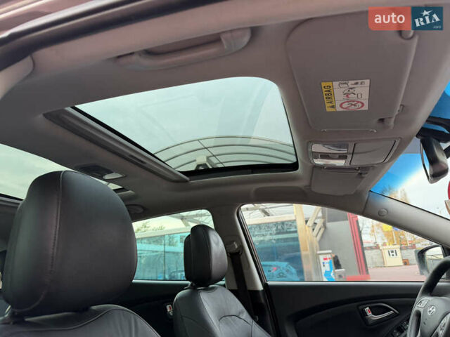 Коричневий Хендай іх35, об'ємом двигуна 2 л та пробігом 230 тис. км за 15300 $, фото 48 на Automoto.ua