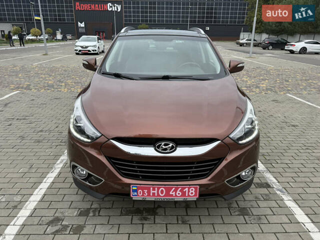 Коричневий Хендай іх35, об'ємом двигуна 2 л та пробігом 211 тис. км за 17400 $, фото 7 на Automoto.ua