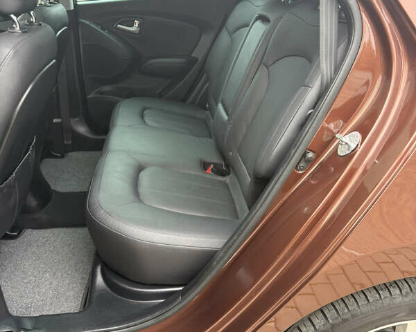 Коричневий Хендай іх35, об'ємом двигуна 2 л та пробігом 211 тис. км за 17400 $, фото 84 на Automoto.ua