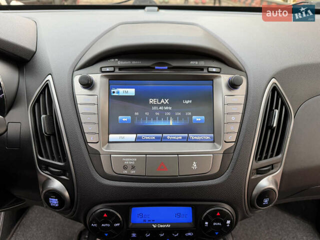 Коричневий Хендай іх35, об'ємом двигуна 2 л та пробігом 230 тис. км за 15300 $, фото 44 на Automoto.ua