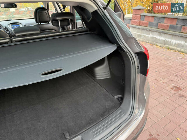 Коричневий Хендай іх35, об'ємом двигуна 2 л та пробігом 230 тис. км за 15300 $, фото 35 на Automoto.ua