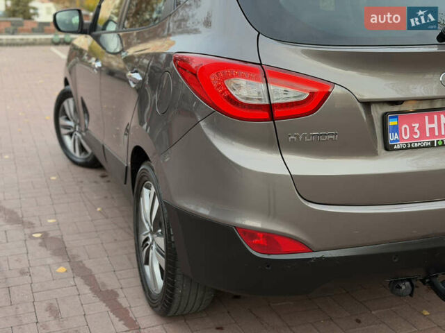 Коричневий Хендай іх35, об'ємом двигуна 2 л та пробігом 230 тис. км за 15300 $, фото 61 на Automoto.ua