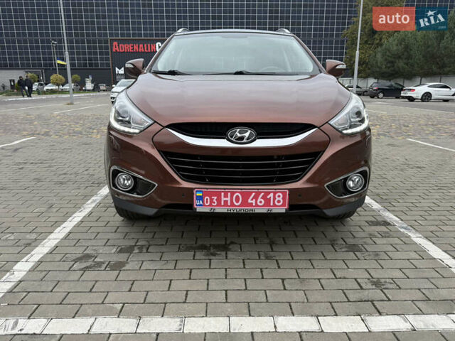 Коричневий Хендай іх35, об'ємом двигуна 2 л та пробігом 211 тис. км за 17400 $, фото 5 на Automoto.ua