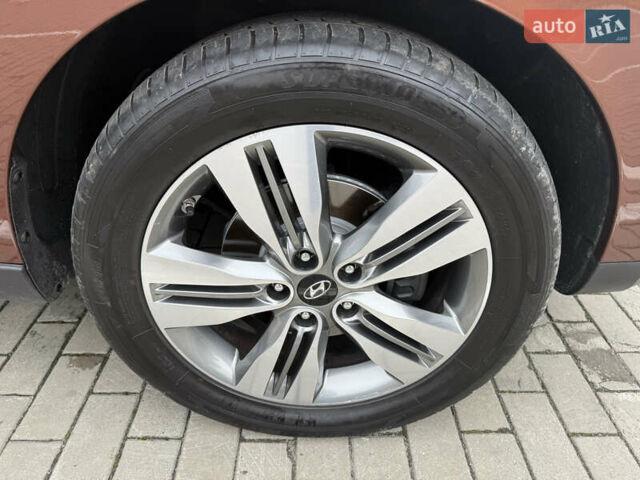 Коричневий Хендай іх35, об'ємом двигуна 2 л та пробігом 211 тис. км за 17400 $, фото 46 на Automoto.ua