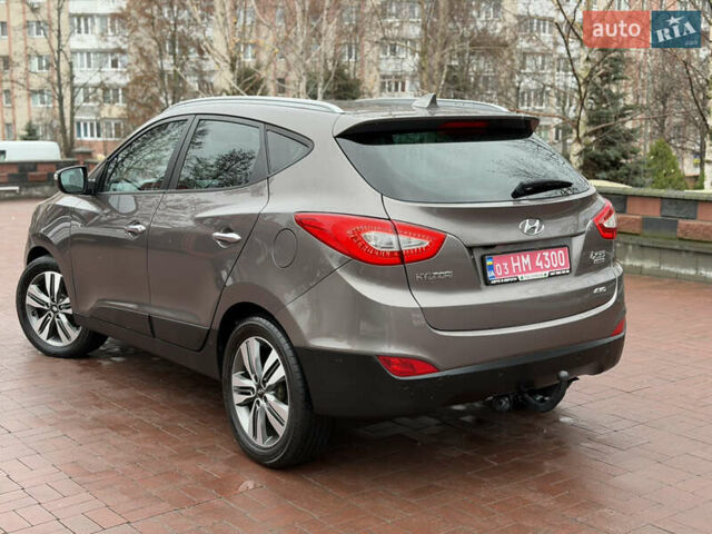 Коричневий Хендай іх35, об'ємом двигуна 2 л та пробігом 230 тис. км за 14300 $, фото 45 на Automoto.ua
