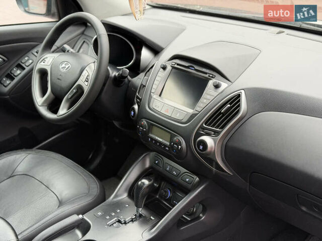 Коричневий Хендай іх35, об'ємом двигуна 2 л та пробігом 230 тис. км за 14300 $, фото 26 на Automoto.ua