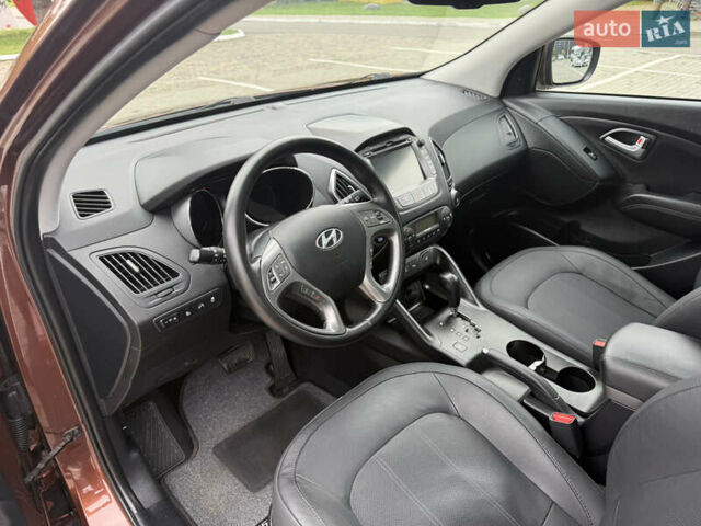 Коричневий Хендай іх35, об'ємом двигуна 2 л та пробігом 211 тис. км за 17400 $, фото 103 на Automoto.ua