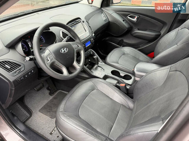 Коричневий Хендай іх35, об'ємом двигуна 2 л та пробігом 230 тис. км за 14300 $, фото 56 на Automoto.ua