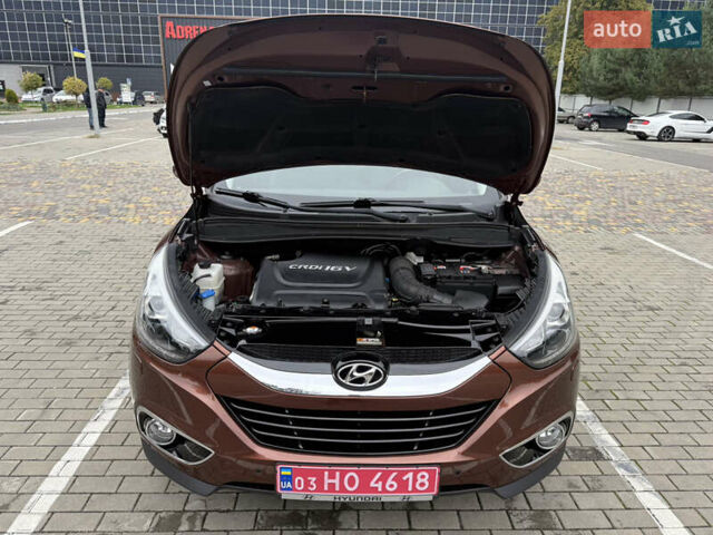Коричневий Хендай іх35, об'ємом двигуна 2 л та пробігом 211 тис. км за 17400 $, фото 28 на Automoto.ua