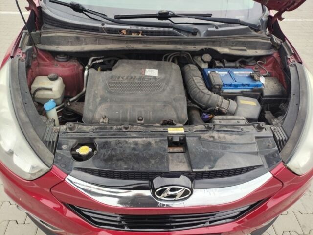 Красный Хендай их35, объемом двигателя 2 л и пробегом 238 тыс. км за 10200 $, фото 6 на Automoto.ua
