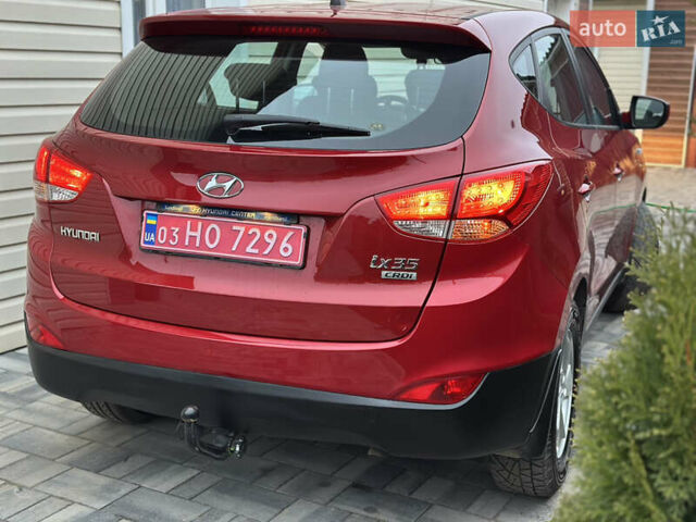Червоний Хендай іх35, об'ємом двигуна 1.7 л та пробігом 240 тис. км за 10700 $, фото 21 на Automoto.ua