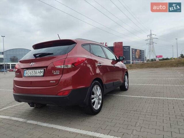 Красный Хендай их35, объемом двигателя 2 л и пробегом 238 тыс. км за 10800 $, фото 4 на Automoto.ua