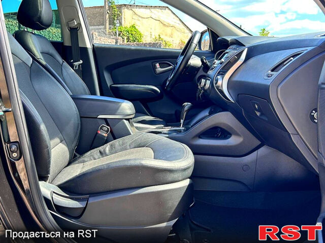 Хендай іх35, об'ємом двигуна 2 л та пробігом 162 тис. км за 10800 $, фото 12 на Automoto.ua