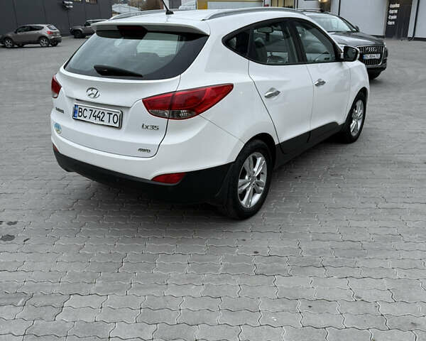 Хендай их35, объемом двигателя 2 л и пробегом 165 тыс. км за 11100 $, фото 7 на Automoto.ua