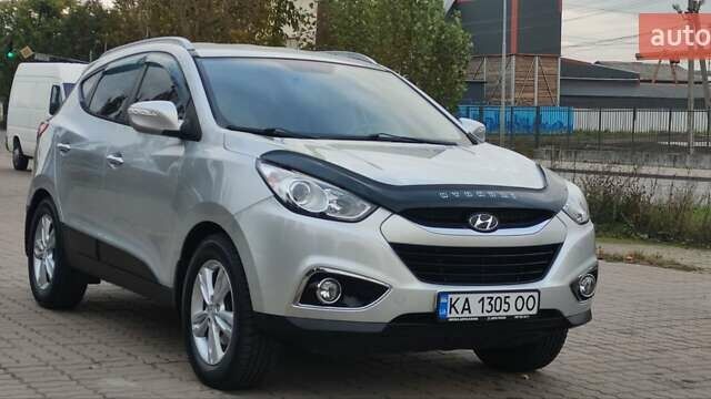 Серый Хендай их35, объемом двигателя 2 л и пробегом 151 тыс. км за 11450 $, фото 11 на Automoto.ua