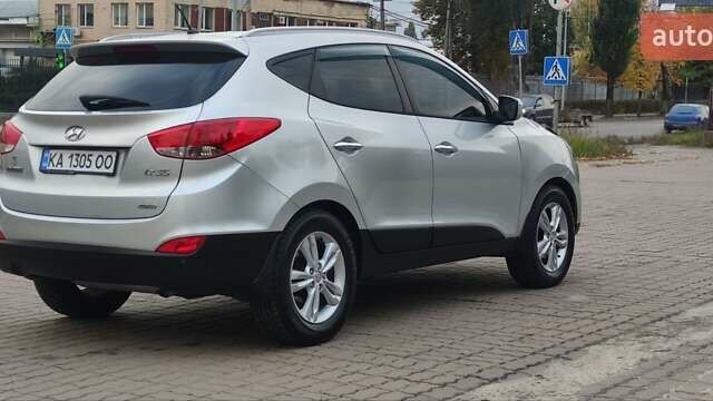 Серый Хендай их35, объемом двигателя 2 л и пробегом 151 тыс. км за 11450 $, фото 13 на Automoto.ua