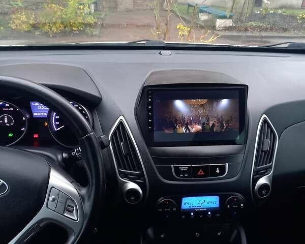 Серый Хендай их35, объемом двигателя 2 л и пробегом 244 тыс. км за 10950 $, фото 29 на Automoto.ua