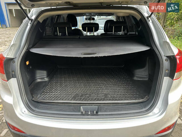 Сірий Хендай іх35, об'ємом двигуна 2 л та пробігом 215 тис. км за 11600 $, фото 6 на Automoto.ua
