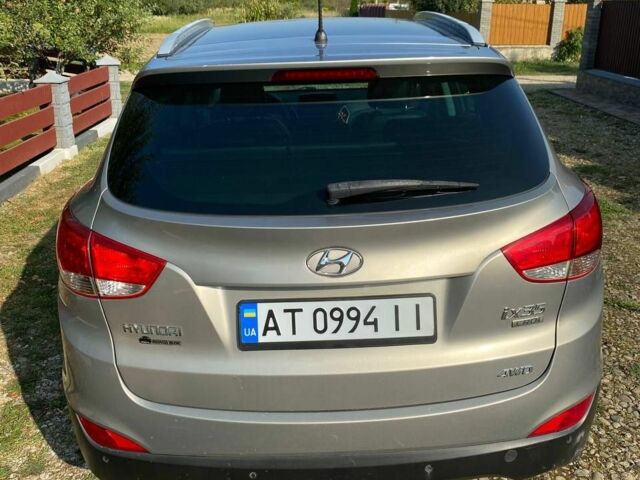 Сірий Хендай іх35, об'ємом двигуна 2 л та пробігом 244 тис. км за 10300 $, фото 4 на Automoto.ua