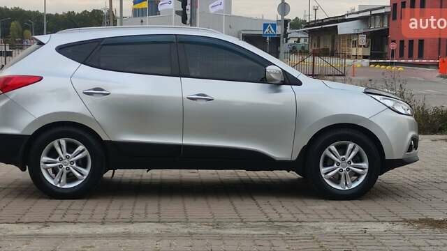 Серый Хендай их35, объемом двигателя 2 л и пробегом 151 тыс. км за 11450 $, фото 12 на Automoto.ua