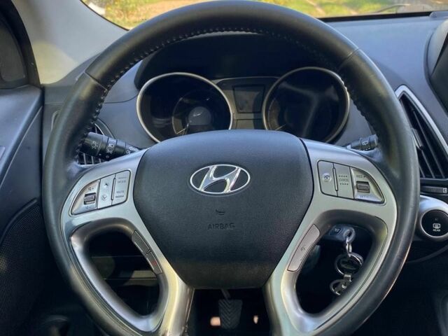 Сірий Хендай іх35, об'ємом двигуна 2 л та пробігом 244 тис. км за 10300 $, фото 13 на Automoto.ua