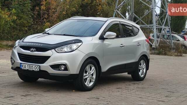 Серый Хендай их35, объемом двигателя 2 л и пробегом 151 тыс. км за 11450 $, фото 5 на Automoto.ua