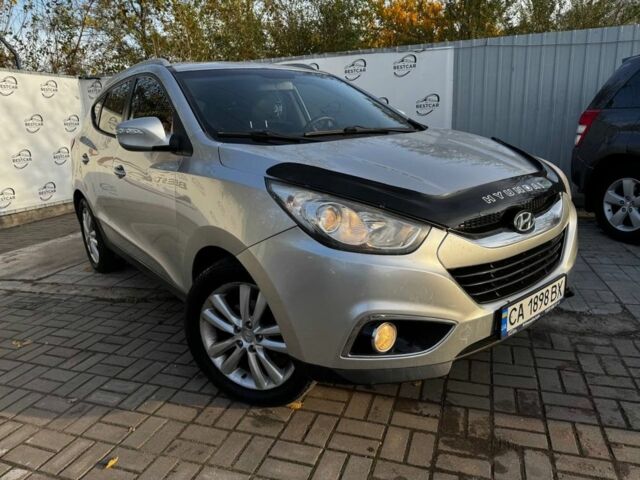 Сірий Хендай іх35, об'ємом двигуна 2 л та пробігом 228 тис. км за 10999 $, фото 1 на Automoto.ua