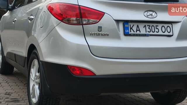 Серый Хендай их35, объемом двигателя 2 л и пробегом 151 тыс. км за 11450 $, фото 6 на Automoto.ua