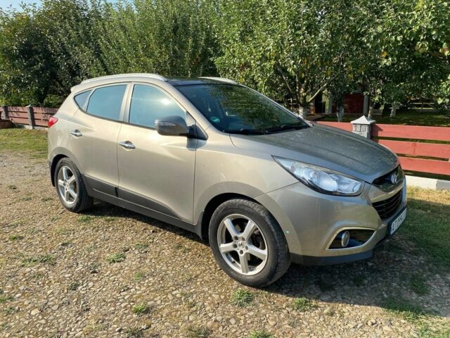 Сірий Хендай іх35, об'ємом двигуна 2 л та пробігом 244 тис. км за 10300 $, фото 6 на Automoto.ua