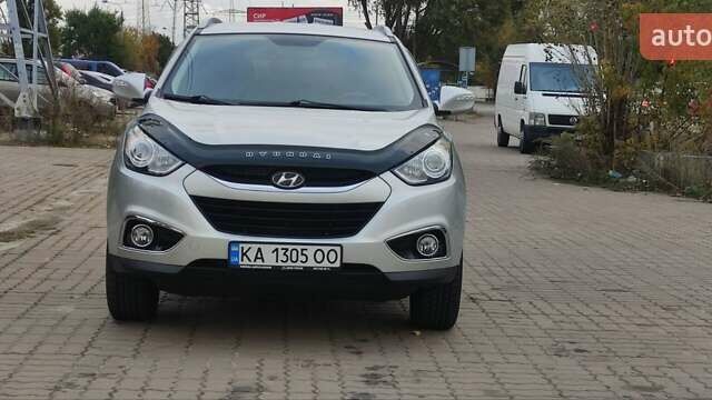 Серый Хендай их35, объемом двигателя 2 л и пробегом 151 тыс. км за 11450 $, фото 9 на Automoto.ua