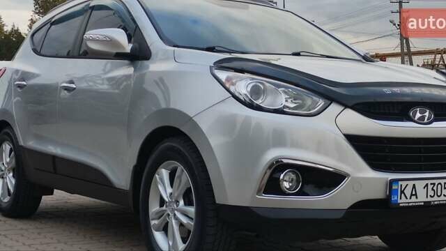 Серый Хендай их35, объемом двигателя 2 л и пробегом 151 тыс. км за 11450 $, фото 14 на Automoto.ua