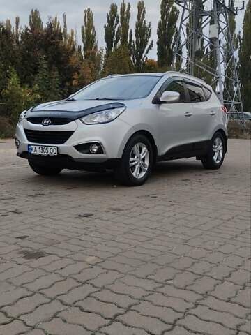 Серый Хендай их35, объемом двигателя 2 л и пробегом 151 тыс. км за 11450 $, фото 20 на Automoto.ua