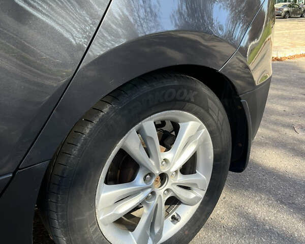 Сірий Хендай іх35, об'ємом двигуна 2 л та пробігом 279 тис. км за 8300 $, фото 5 на Automoto.ua