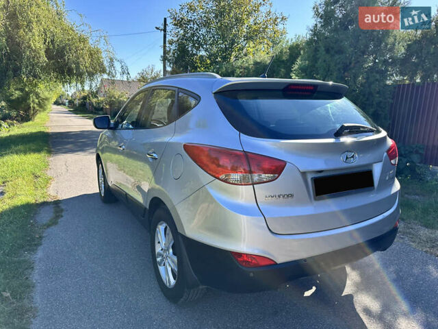 Сірий Хендай іх35, об'ємом двигуна 2 л та пробігом 194 тис. км за 11490 $, фото 2 на Automoto.ua