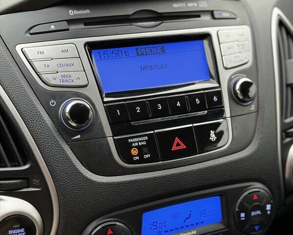 Серый Хендай их35, объемом двигателя 2 л и пробегом 190 тыс. км за 12500 $, фото 12 на Automoto.ua