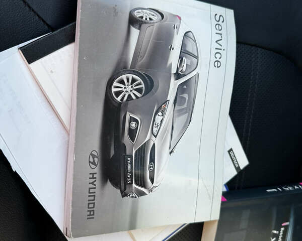 Серый Хендай их35, объемом двигателя 2 л и пробегом 229 тыс. км за 13500 $, фото 37 на Automoto.ua